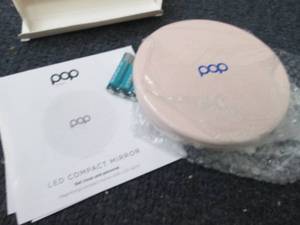 lot 63 image: Pop Sonic Compact LED Lighted Mirro...
