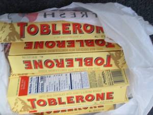 lot 97 image: 12- 3.52 oz Toblerone...