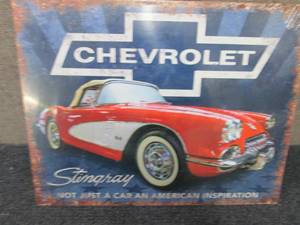 lot 202 image: 12.5 x 16 inch Metal Sting Ray Sign...