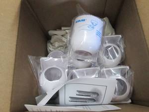 lot 243 image: 4- 12pks QuikCare 7 oz Holders...
