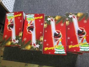 lot 157 image: 8 merry christmas animated toys 