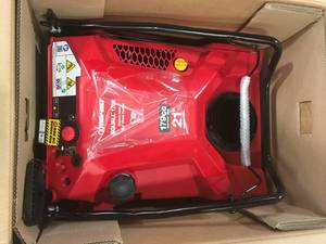 lot 2 image: Troy-Bilt  Squall 21 in. 179 cc Single-Stage Gas Snow Blower with Electric Start and E-Z Chute Control  Customer Returns See Pictures