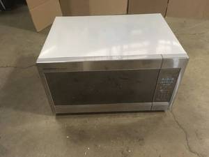 lot 20 image: Sharp - 1.8 Cu. Ft. Full-Size Microwave - Stainless steel Used See Pictures