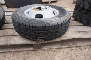 1 - General Grabber Truck Tire On 8 Bolt Rim