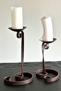 lot 23 image: Pair of Metal Scroll Design Candle Holders