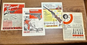 lot 23 image: (4) Vintage Daisy Air Rifle Advertising Pieces