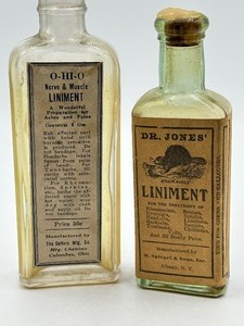 lot 26 image: Two Antique Medical Bottles Dr. Jones Liniment Bottle and O-Hi-O Nerve and Muscle Liniment