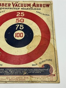 lot 30 image: Antique Rubber Vacuum Arrow Advertising Target