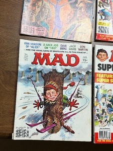 lot 38 image: Six Vintage MAD Magazines