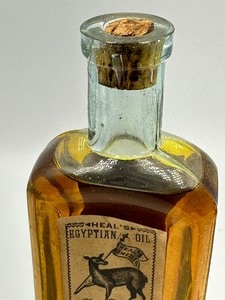 lot 72 image: Antique Medicine Bottle Heals Egyptian Oil Bottle