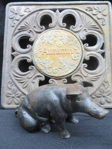 CAST IRON PIG AND STEPPING STONE.