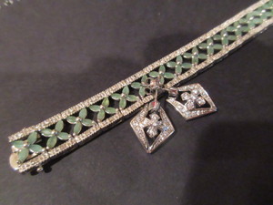 lot 101 image: STERLING SILVER AND GREEN STONE BRACELET AND A PAIR OF PIERCED EARRINGS