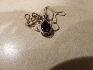 lot 106 image: STERLING AMETHYST PENDANT AND CHAIN