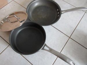 lot 249 image: CALPHALON FRYING PANS AND A LID