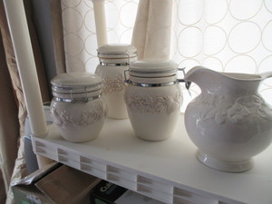 lot 261 image: LOCK TOP CERAMIC CANISTERS AND CERAMIC WATER PITCHER