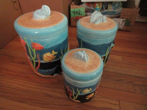 lot 406 image: FISH THEMED CERAMIC CANISTERS IN GRADUATED SIZES
