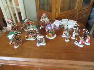 lot 553 image: DEPT. 56 GERMAN THEMED CHRISTMAS MARKET SHOPS AND SHOPKEEPER FIGURINES