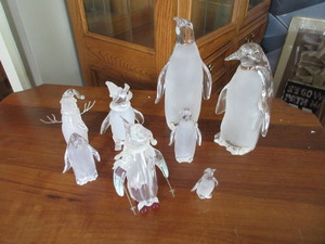 lot 555 image: ACRYLIC PENGUIN AND SNOWMAN FIGURINES