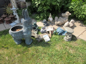 lot 715 image: YARD STATUARY AND PLANTERS