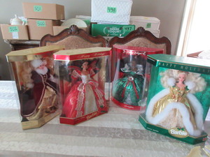 lot 339 image: HOLIDAY BARBIES IN UNOPENED PACKAGES
