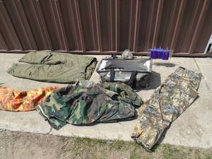 Bag of outdoor clothes, Edie Bauer air force pants & assorted camo. As shown.