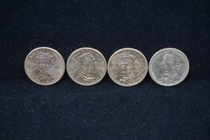 lot 130 image: 4 US Presidential Dollar Coins - Lincoln, Buchanan, Pierce, Fillmore
