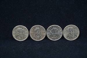 lot 131 image: 4 US Presidential Dollar Coins - Tyler, Harrison, Taylor, Polk