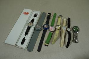 lot 152 image: Assorted Watches - CNN, Swatch, Showtime, Looney Tunes