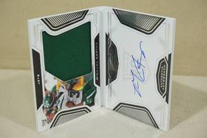 lot 161 image: 2021 Panini Playbook Michael Carter Jersey and Auto Book Football Card - 119299