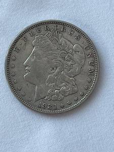 lot 8 image: 1921-D Morgan Silver Dollar