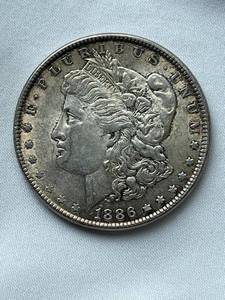 lot 17 image: 1886 Morgan Silver Dollar