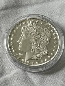 lot 63 image: Morgan One Troy Ounce Fine Silver-Bullion Round in Sealed Case