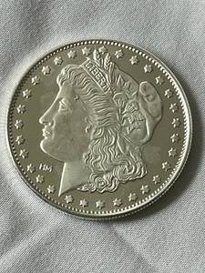 lot 64 image: Morgan One Troy Ounce .999 Fine Silver-Bullion Round in Sealed Case