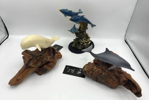 lot 4 image: Sculptures by John Perry (Beluga and Dolphin)
