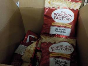 Box of The Popcorn Factory 2 oz Bag...