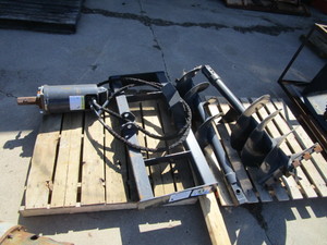 lot 22 image: (New) Skid Steer Post Hole Auger w12 & 18 Augers