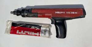 lot 2 image: Hilti DX 36 Semi-Automatic Powder-Actuated Fastening Tool with accessory.