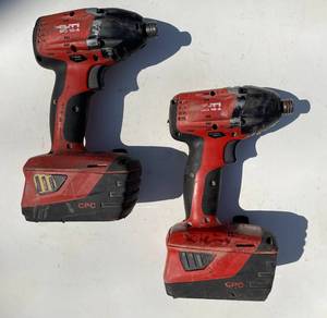 lot 12 image: Lot of 2 Hilti 22-Volt Lithium-Ion 14 Hex Cordless SID 4-A22 Impact Driverswith batteries.