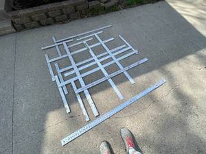 lot 44 image: Large lot of metal of large Drywall squares.