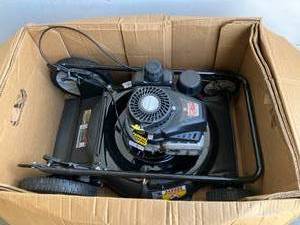 lot 45 image: Yard Machines 21 in. 132 cc OHV Powermore Gas Walk Behind Push Lawn Mower with High Rear Wheels
