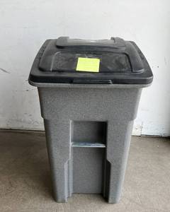 lot 183 image: Toter 32 Gallon Greystone Trash Can with Attached Lid and Wheels