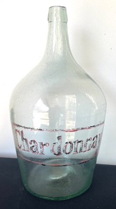 lot 109 image: Distressed Chardonnay, Merlot and Pinot Noir Glass Jugs