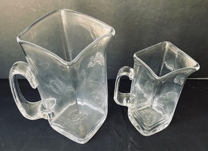 lot 119 image: Two Glass Woodbury Pitchers by Simon Pearce