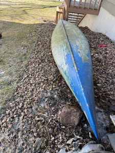 lot 8 image: Cedar Strip 15-foot Fiberglass Coated Canoe