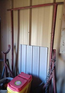 lot 31 image: Ford 8N Tractor Jack that attaches to the Lift Arms on the back of the tractor