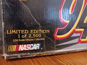 lot 41 image: Racing Champions 124th Scale McDonalds Car # 94 with Stand in Original Box