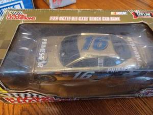 lot 42 image: Racing Champions 124th Scale Primestar Car #16 Die Cast Stock Car Bank in Original Box