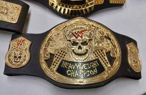 lot 56 image: Nine WWF Souvenir Championship Belts Made of Plastic