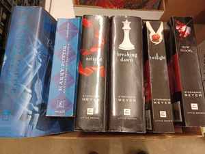 lot 63 image: 29 Assorted Books including Harry Potter, Books by Stephenie Meyer, Naomi Judd, and Assorted Childrens Books
