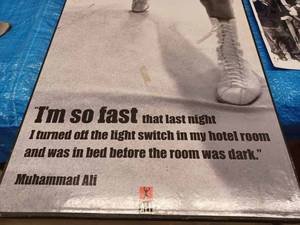 lot 72 image: Large Muhammad Ali Picture 35.75-inches tall X 11.5-inches wide and Two Black & White 8 X 10 Photographs of MLK